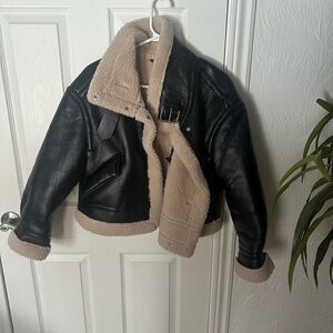 Faux leather jacket with sherpa